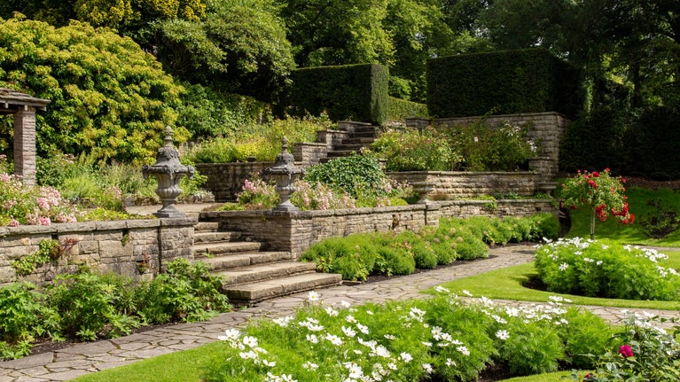 View of the Orangery Terrace in the garden at Lyme Park, Cheshire on a sunny day